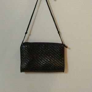 Made in Hong Kong black woven clutch